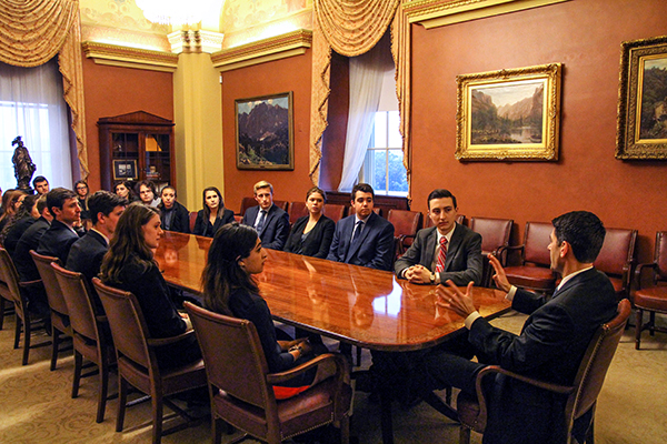 Students seated at a talking to Senator Paul Ryan
