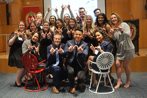 Wisconsin in Washington program students next to terrace chairs