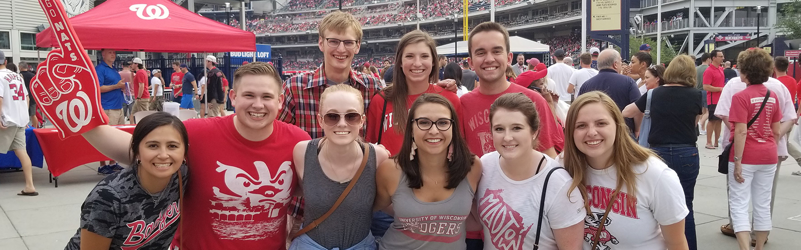 Wisconsin in Washington students wearing Badger gear at sporting event